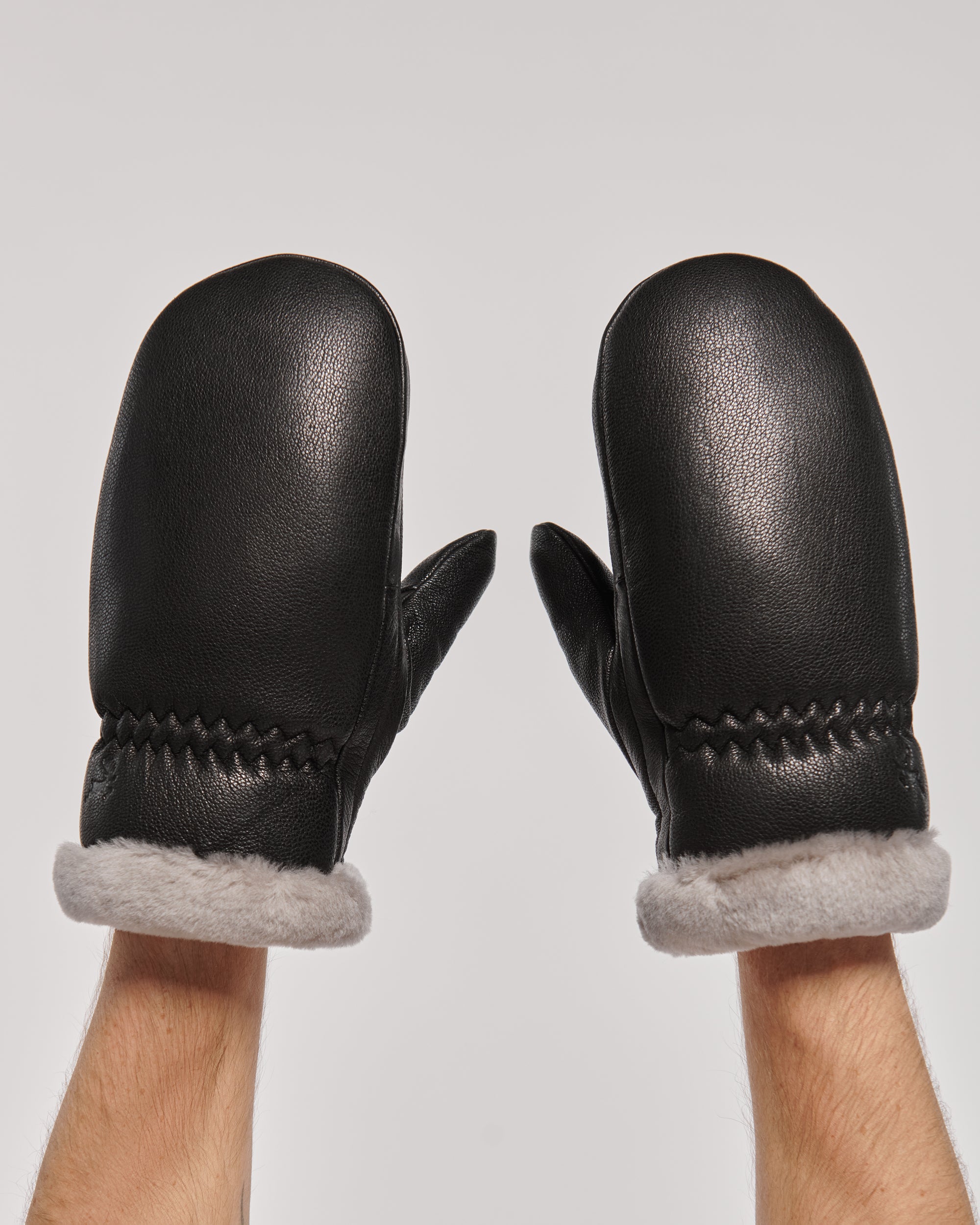 Cozy Men's Leather Mittens with Natural Fur in Black.