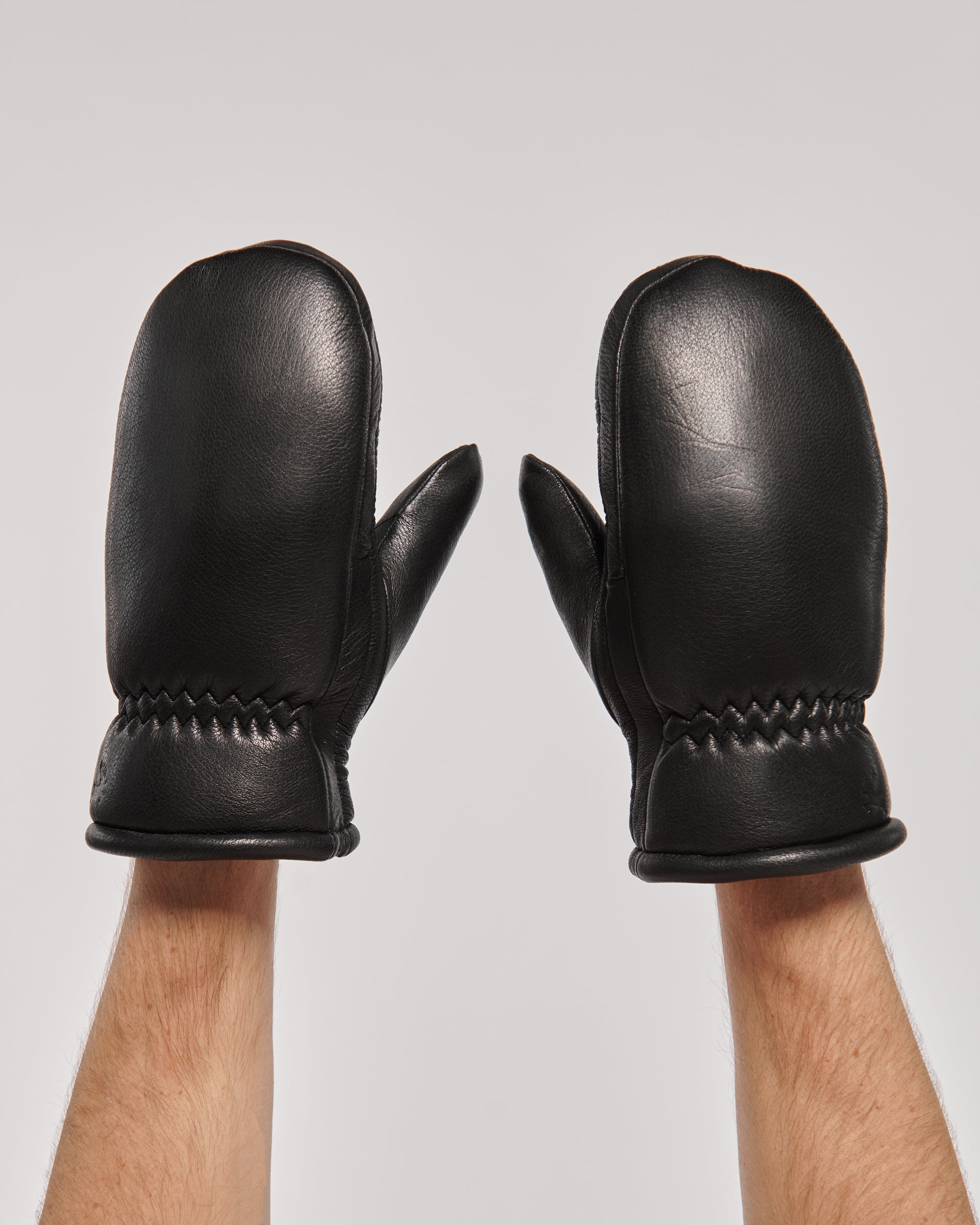 Cozy Men's Leather Mittens with Natural Fur in Black.