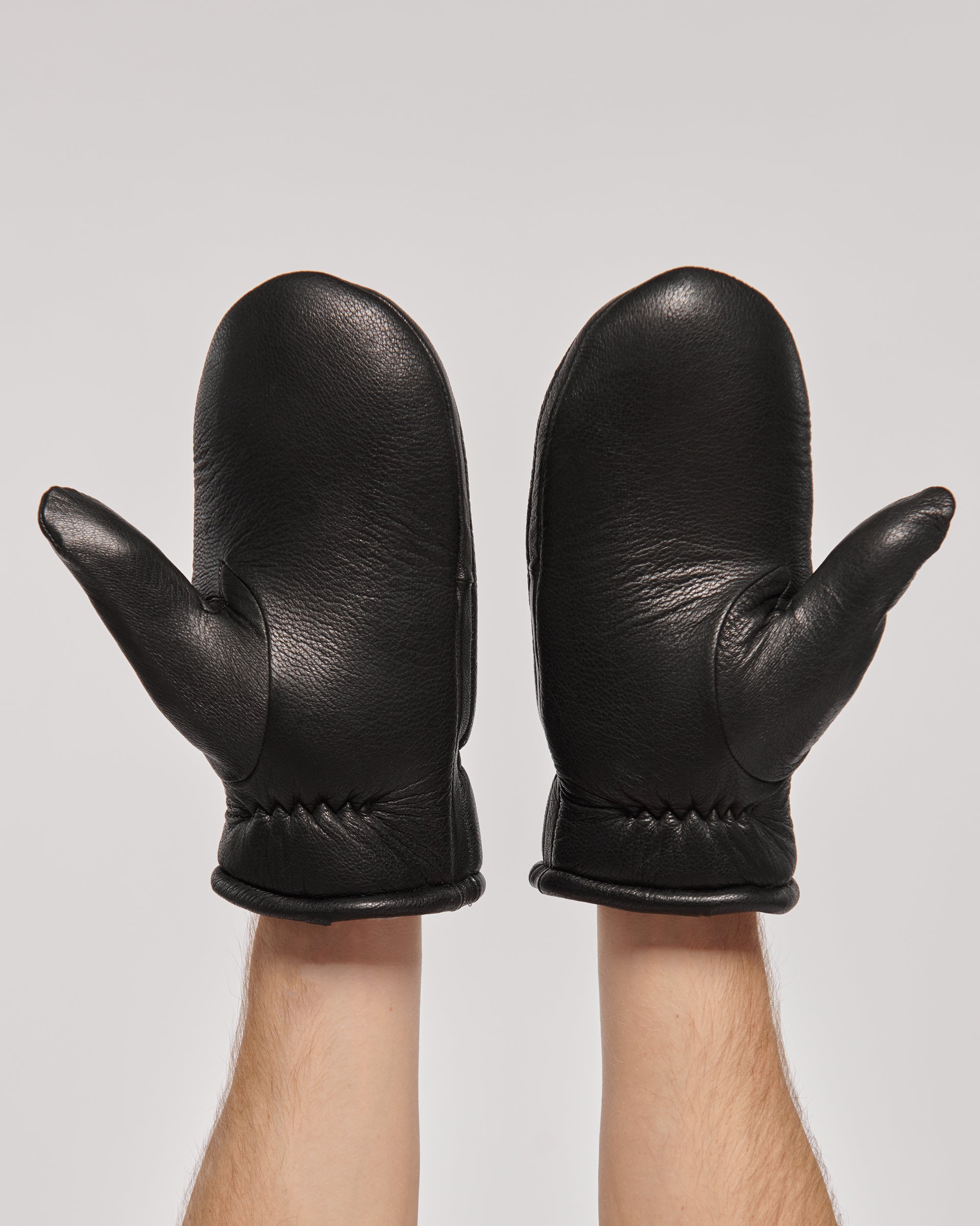 Cozy Men's Leather Mittens with Natural Fur in Black.